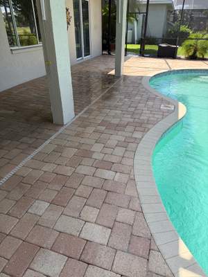 Professional Paver Sealing and Restoration for La Paloma Sun City Center Pool Deck