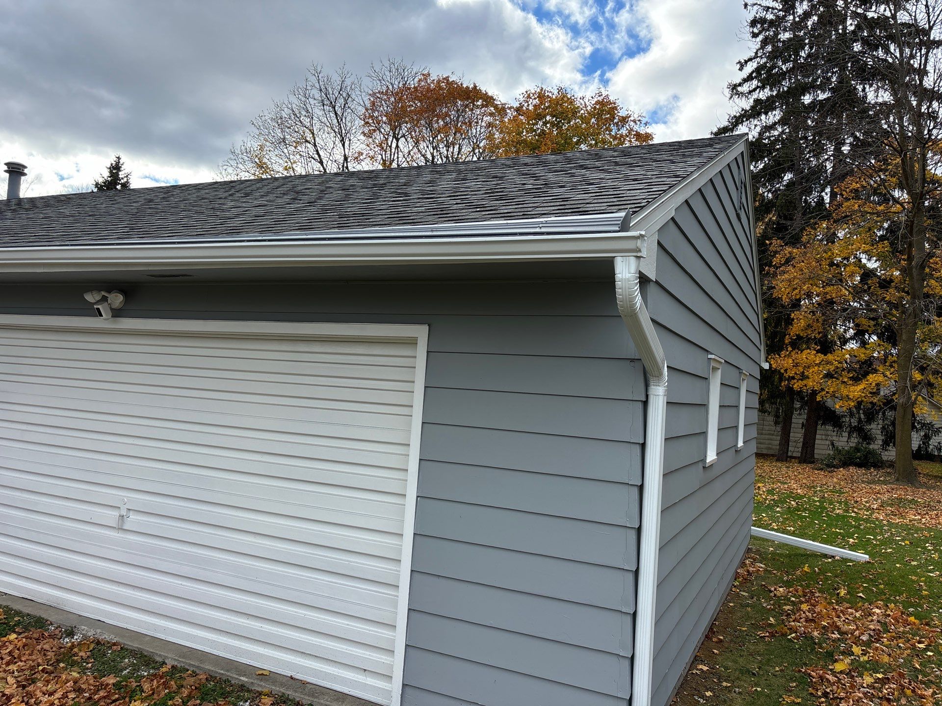 Gutter Installation using Seamless Gutters- Aluminum with Gutter Protection by Acme Exteriors