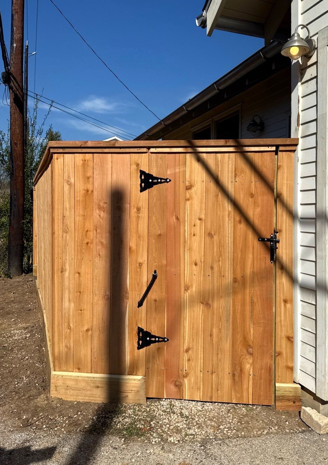 Durable Fence & Gate Installation with Premium Stain by Tim's Fences