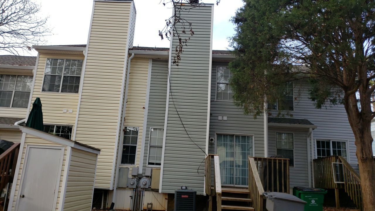 Gutter Cleaning using water by Power Wash Masters LLC