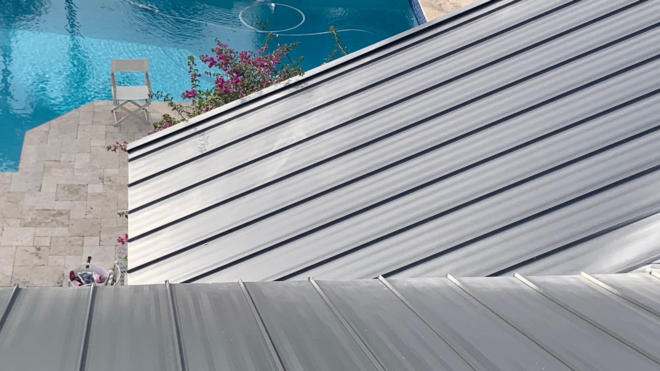 Residential Roofing Installation using 1" Nail strip metal roof by BLUES BROTHERS ROOFING