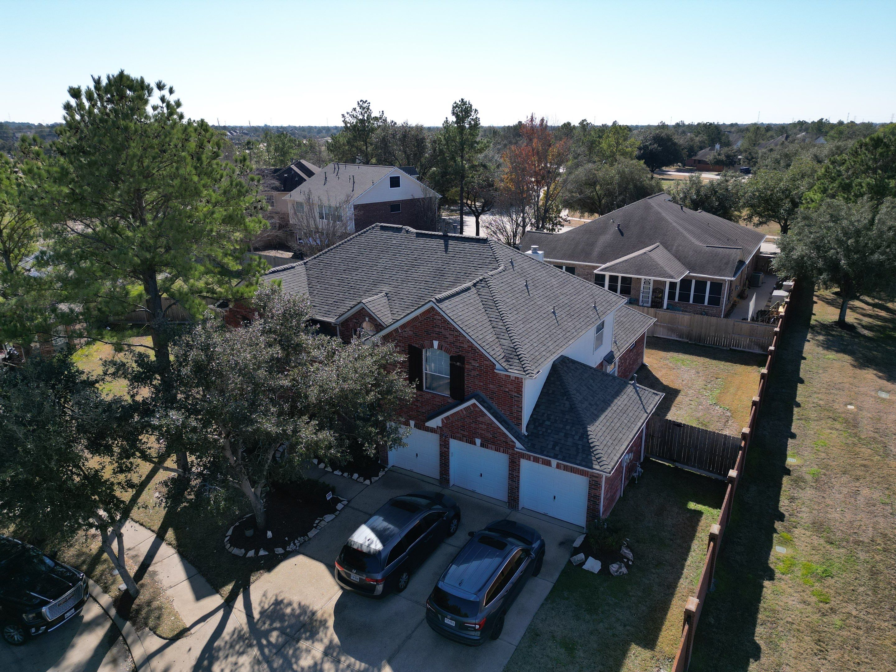OC Duration Driftwood by HHH Roofing & Construction