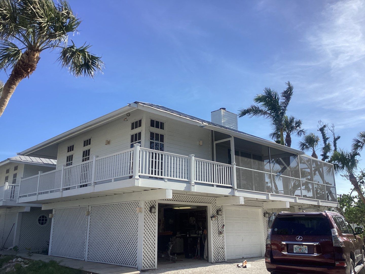 White Gutter Installation in Sanibel FL by Gutter Professors