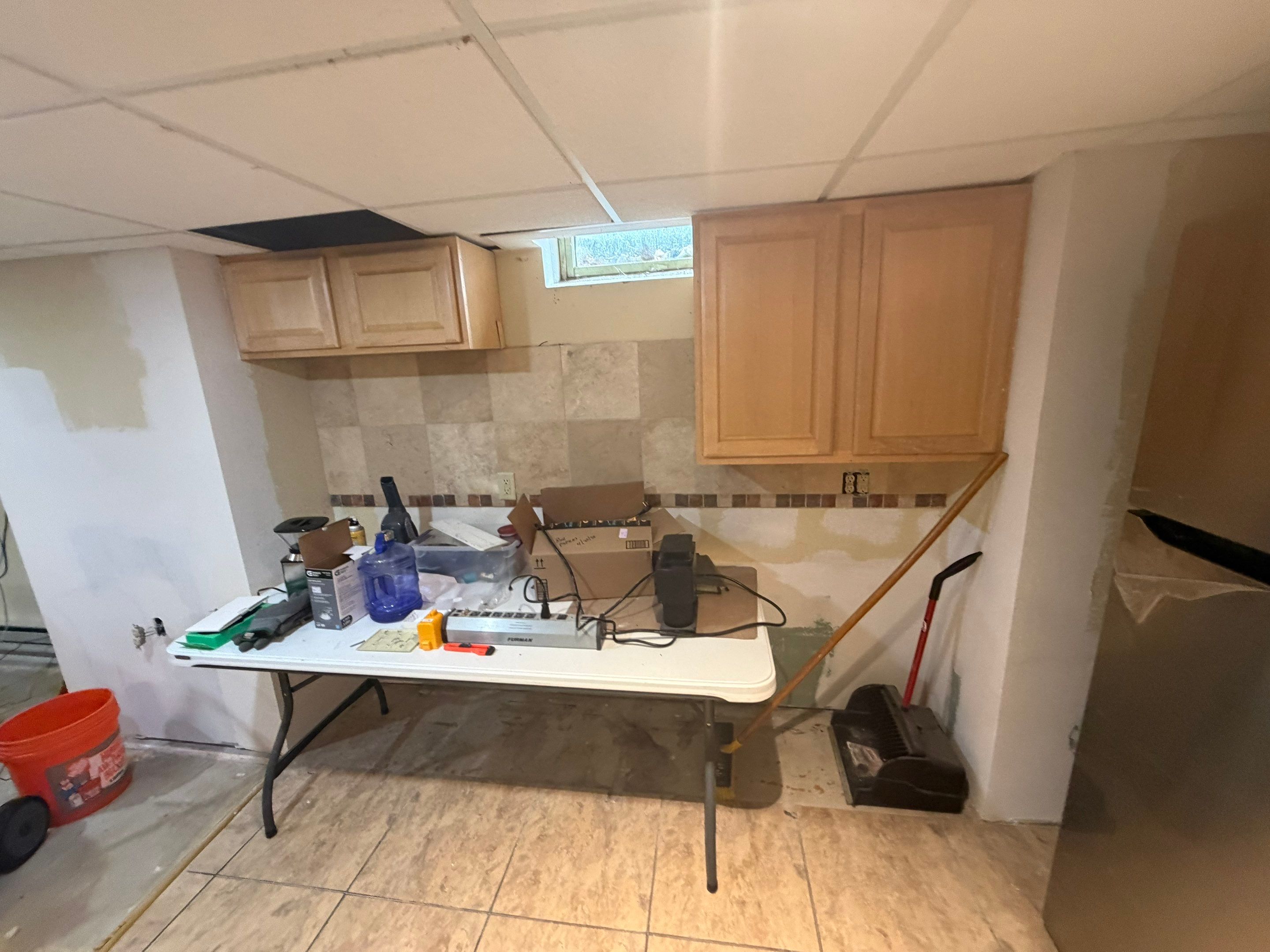 Basement Kitchen Renovation and Interior Wall Finishing in Brookfield by OCS Contracting Services