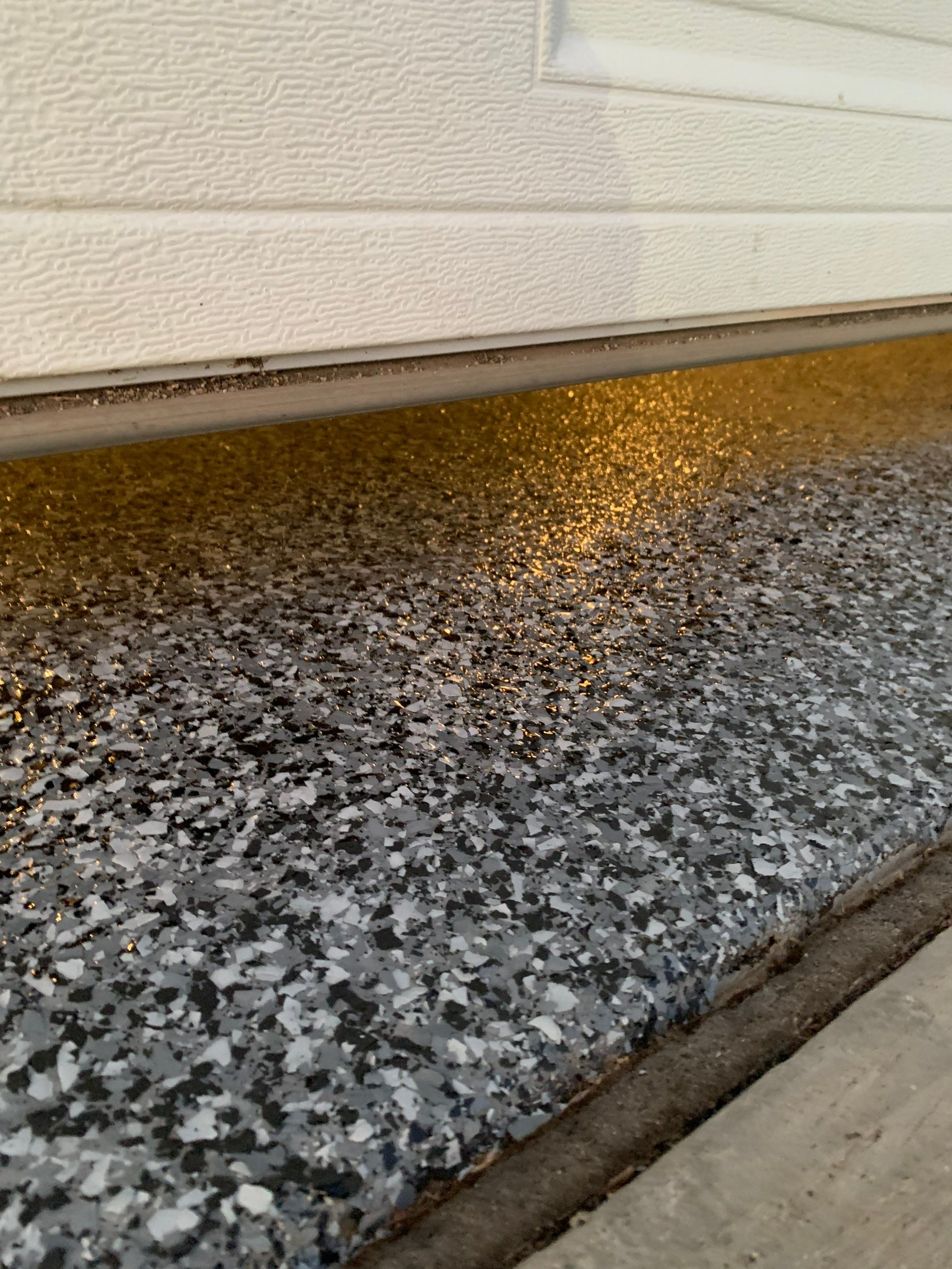 Speckled Epoxy Garage Floor Coating and Concrete Repair in Lennox by Select Painting, Coatings & Garage Cabinets