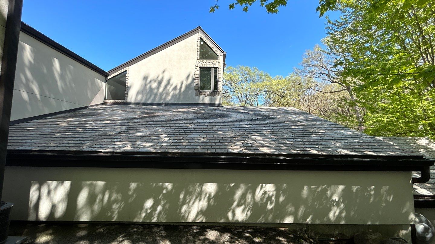 natural stone using Algaecide, soft wash soap by Northern Power Washing LLC.