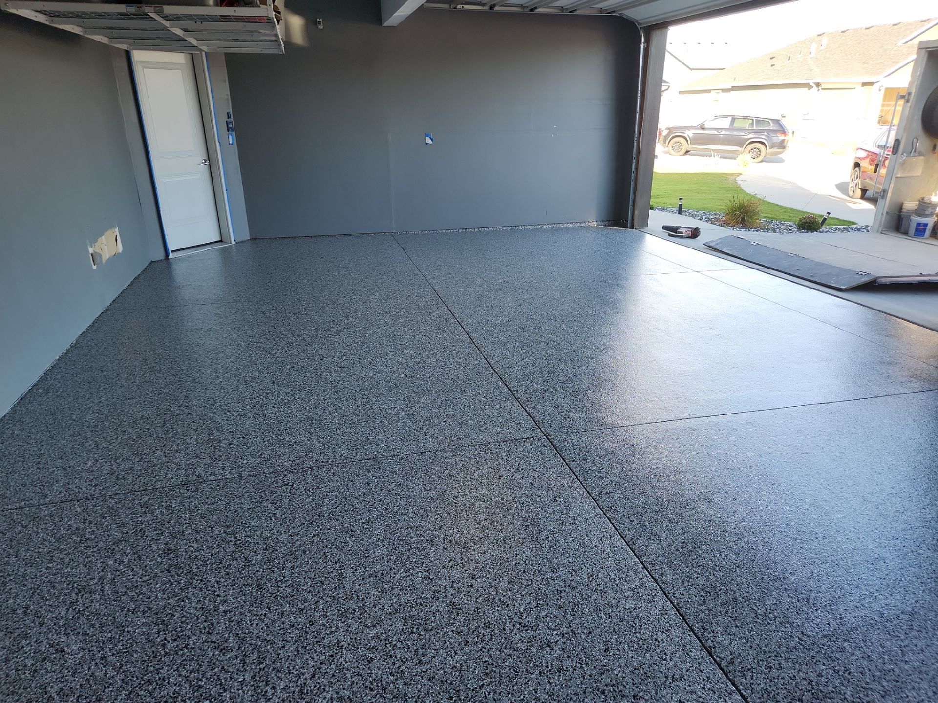 Garage Transformation using Domino by Croc Coatings, LLC