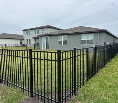 Aluminum Fence Installation using Black 3 Rail Aluminum Fence