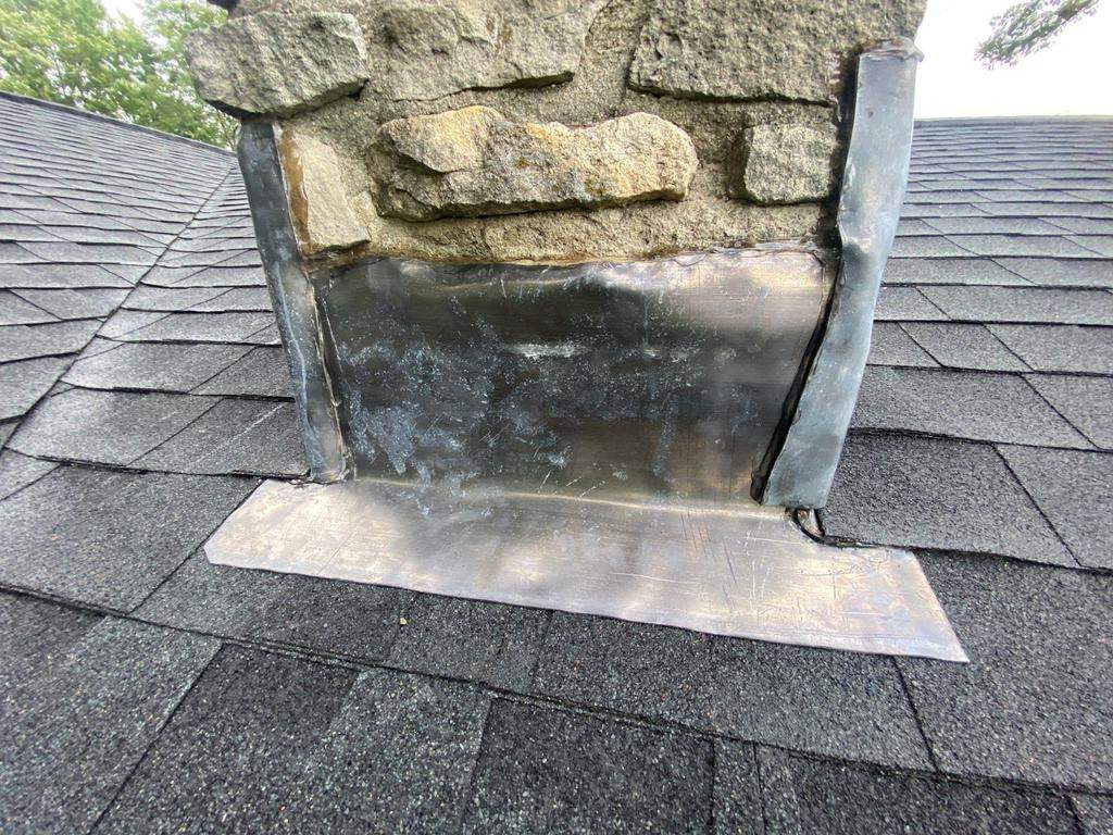 Storm damage roof replacement by Nitro Roofing and Construction