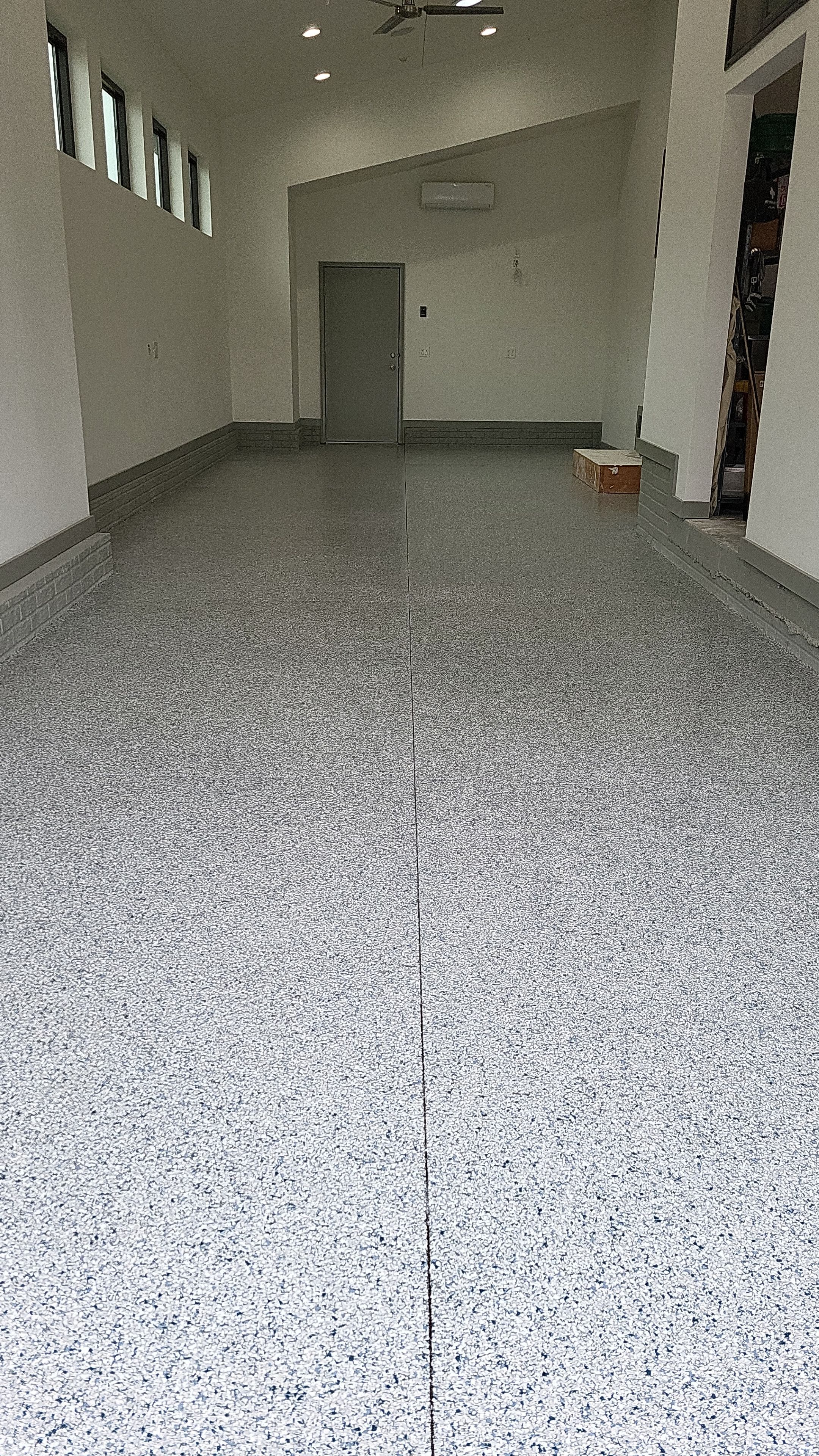 Tidal Wave Garage Floor Coating using Polyaspartic by Revival Concrete Coatings