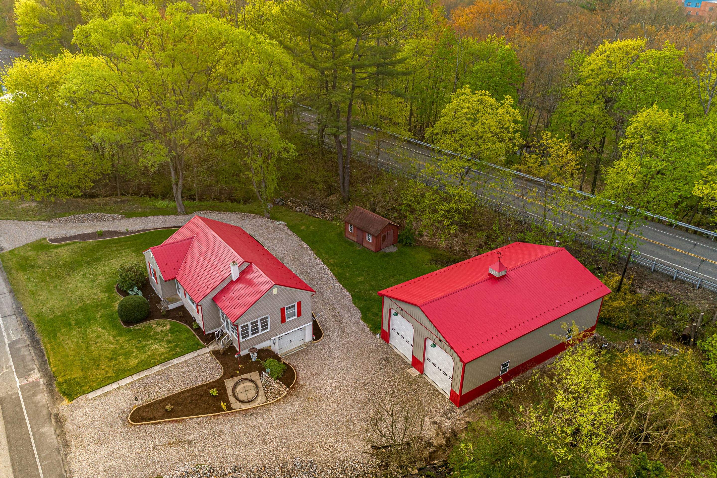 Metal Roof-scarlet red by Esh Builders