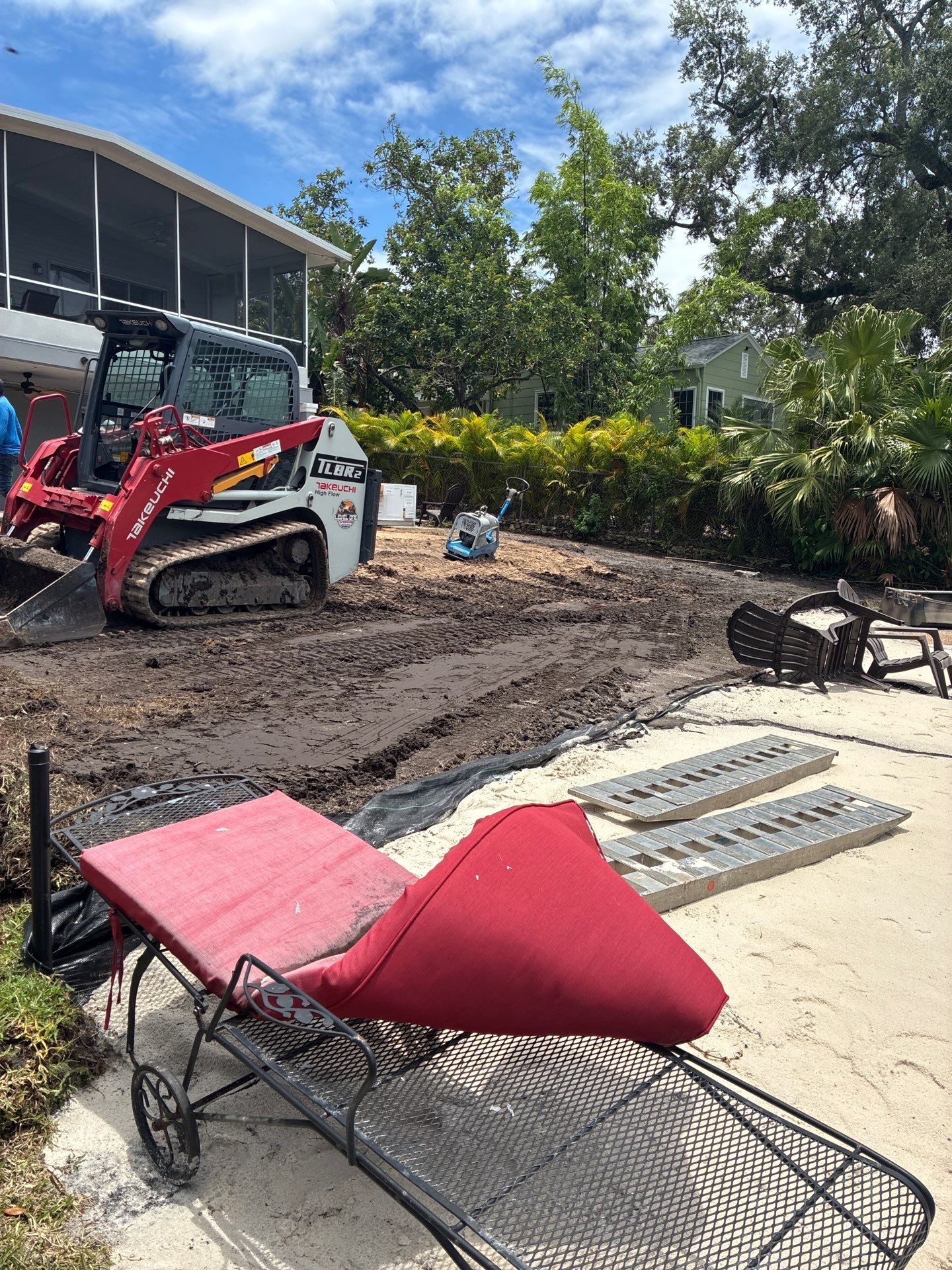 Grading back yard oasis by Level One Grading