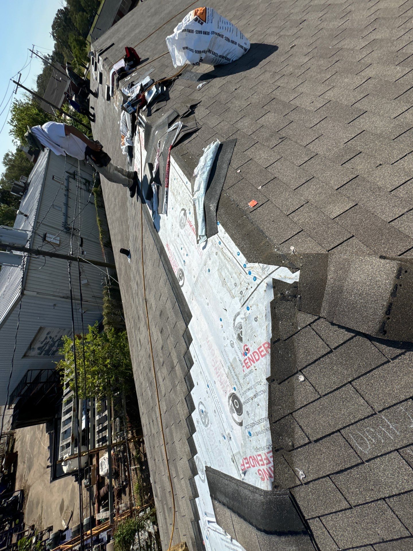 Apartment Roof Replacement by Associates Roofing Unlimited 