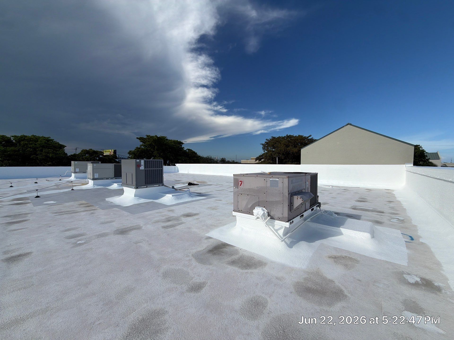 Commercial Flat Roof Restoration and Elastomeric Waterproofing in Delray Beach by Roof King LLC