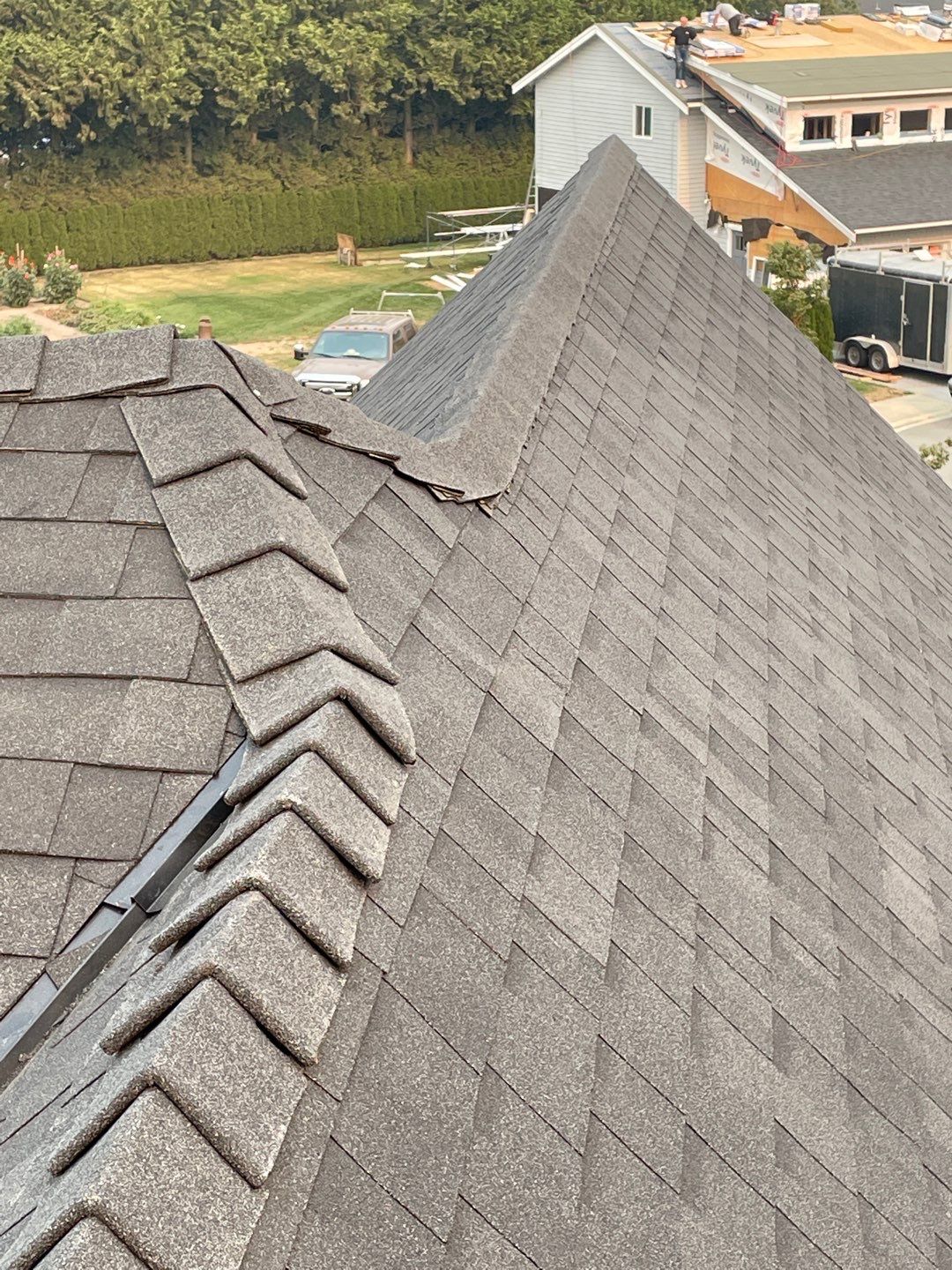 Residential Roofing Installation using OC Oakridge shingles with prolok accent roofs by Top Notch Roofing Inc