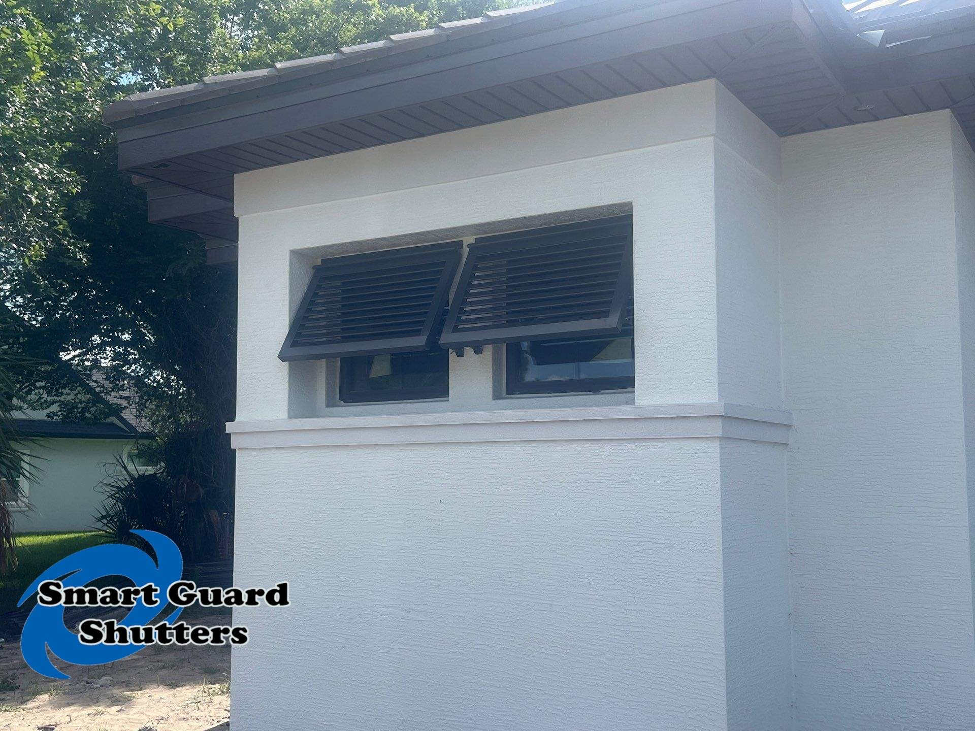 Decorative Bahamas in Umbra Grey by Smart Guard Shutters