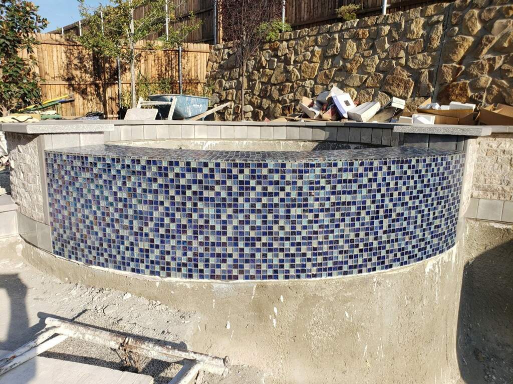 Freeform Pool with Raised Spa and Stone Coping by Pinnacle Pools and Spas - DFW