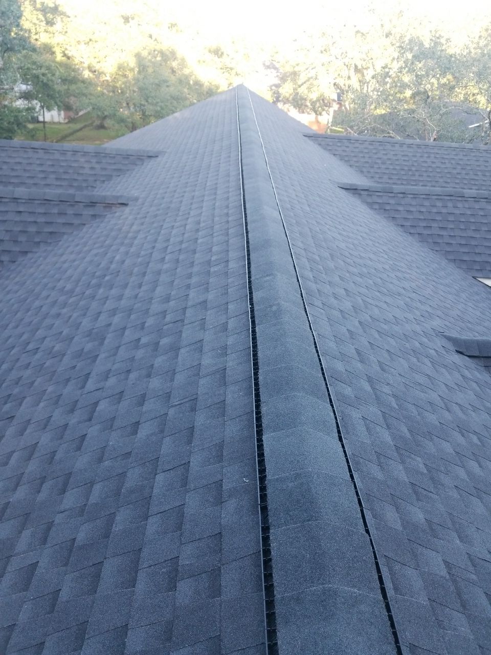 Residential Roofing Installation using Roof Replacement by American Roofing & Construction LLC