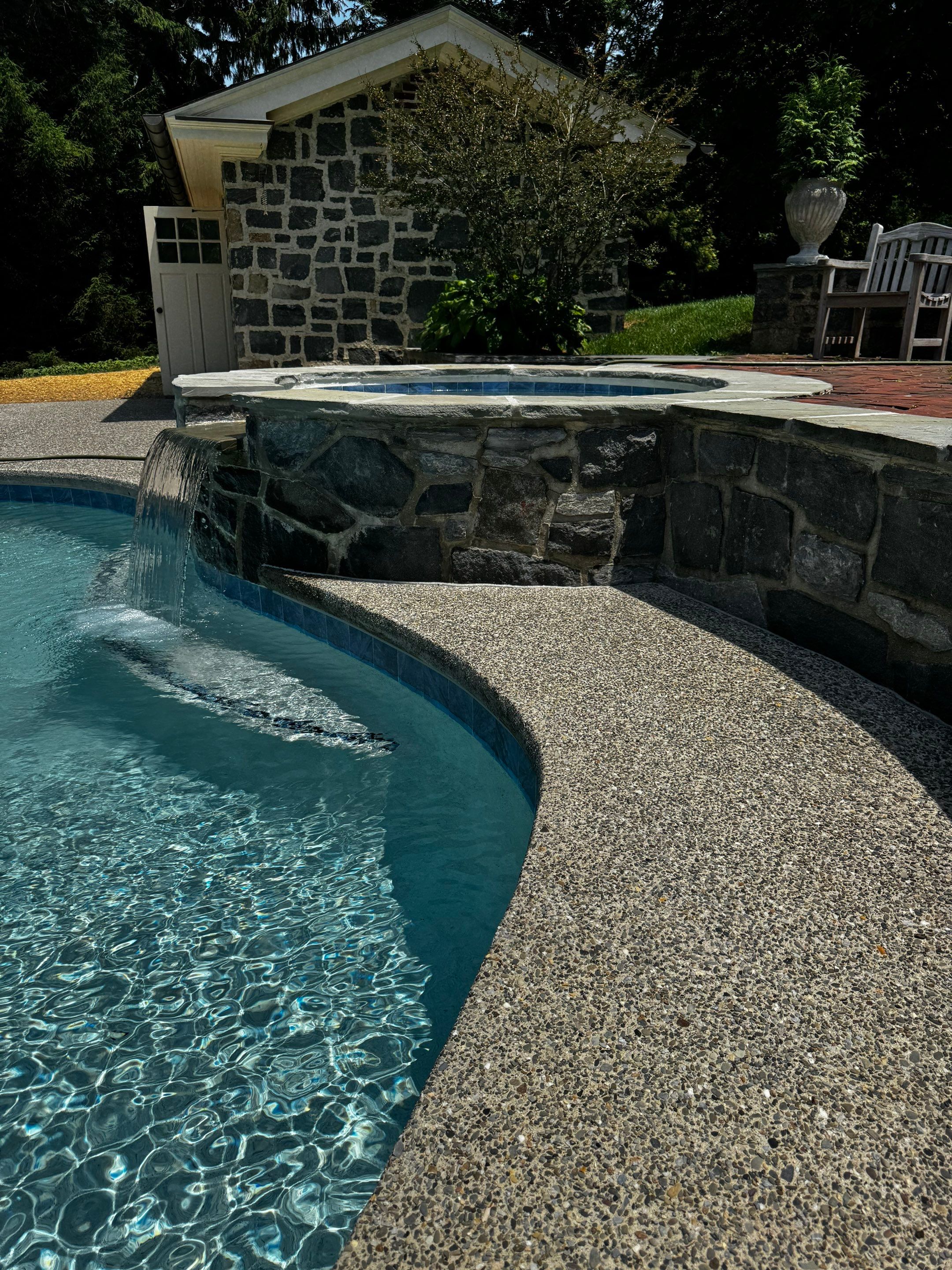 Exposed Aggregate Pool Deck Renovation in Villanova by Architectural Concrete Design