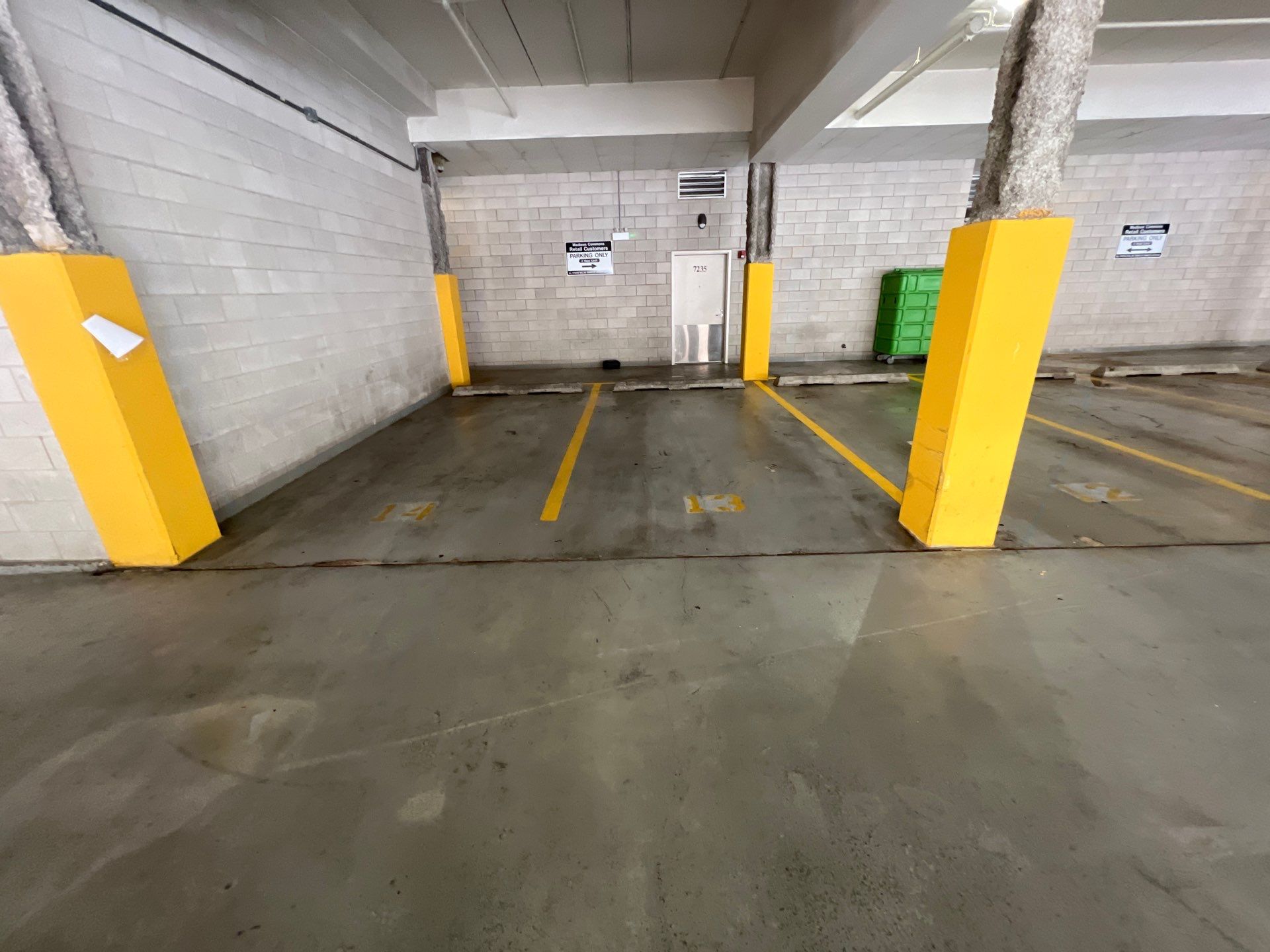 Parking garage using Hot water by Northern Power Washing LLC.