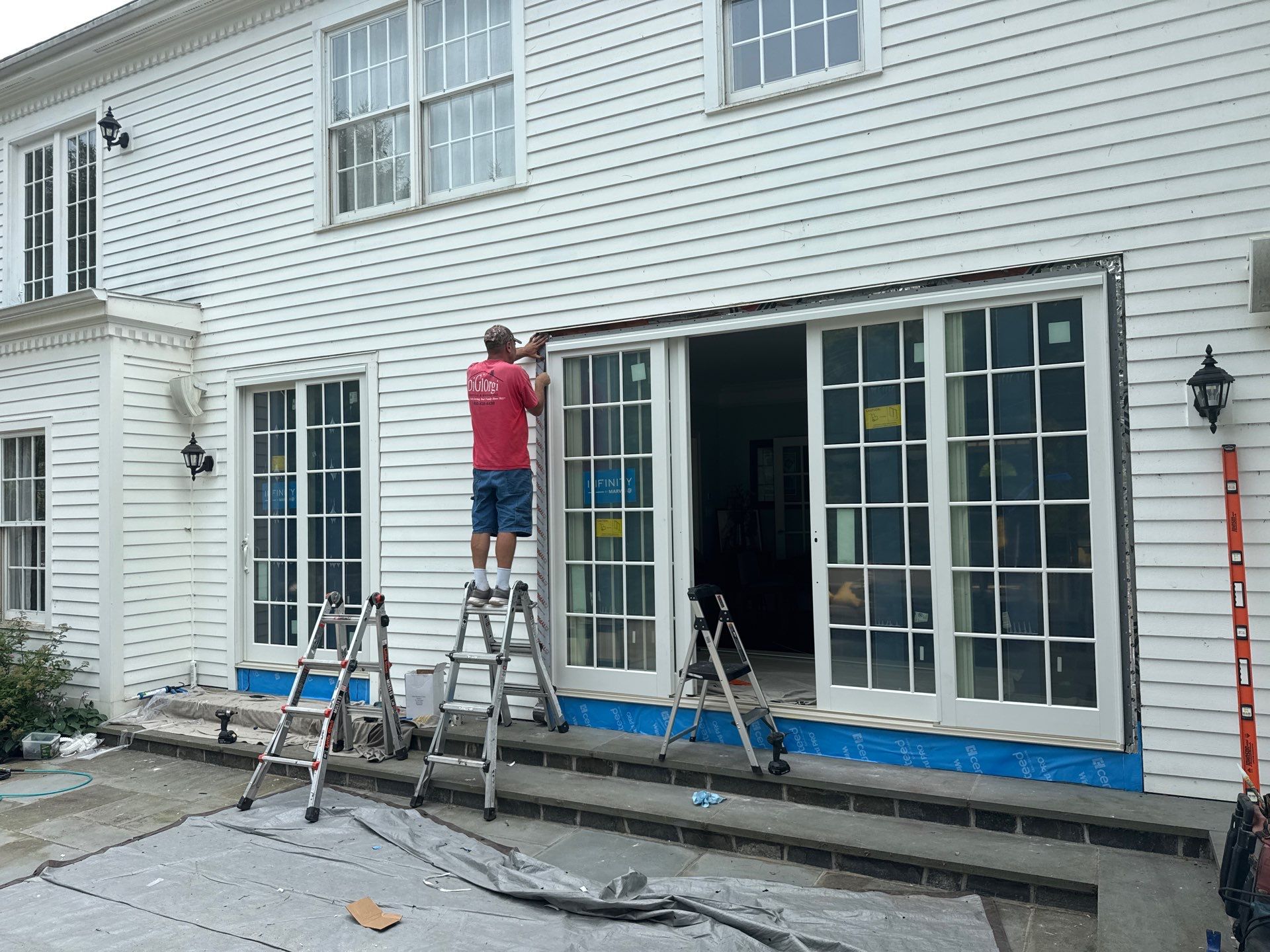 Patio Door Installation Using Infinity by Marvin Patio Door by DiGiorgi Roofing and Siding Inc