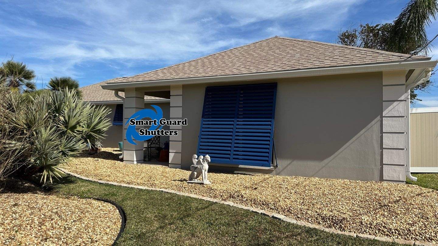 Hurricane Rated Bahama Shutters in Violet Blue / Motorized Bug Screen by Smart Guard Shutters