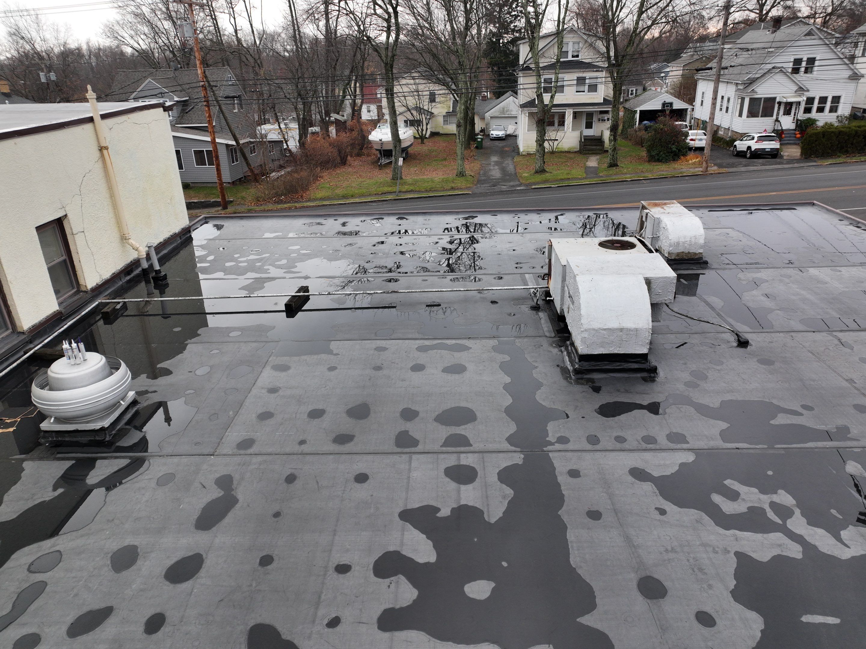 Commercial Roofing Installation using EPDM  by A Plus Exterior