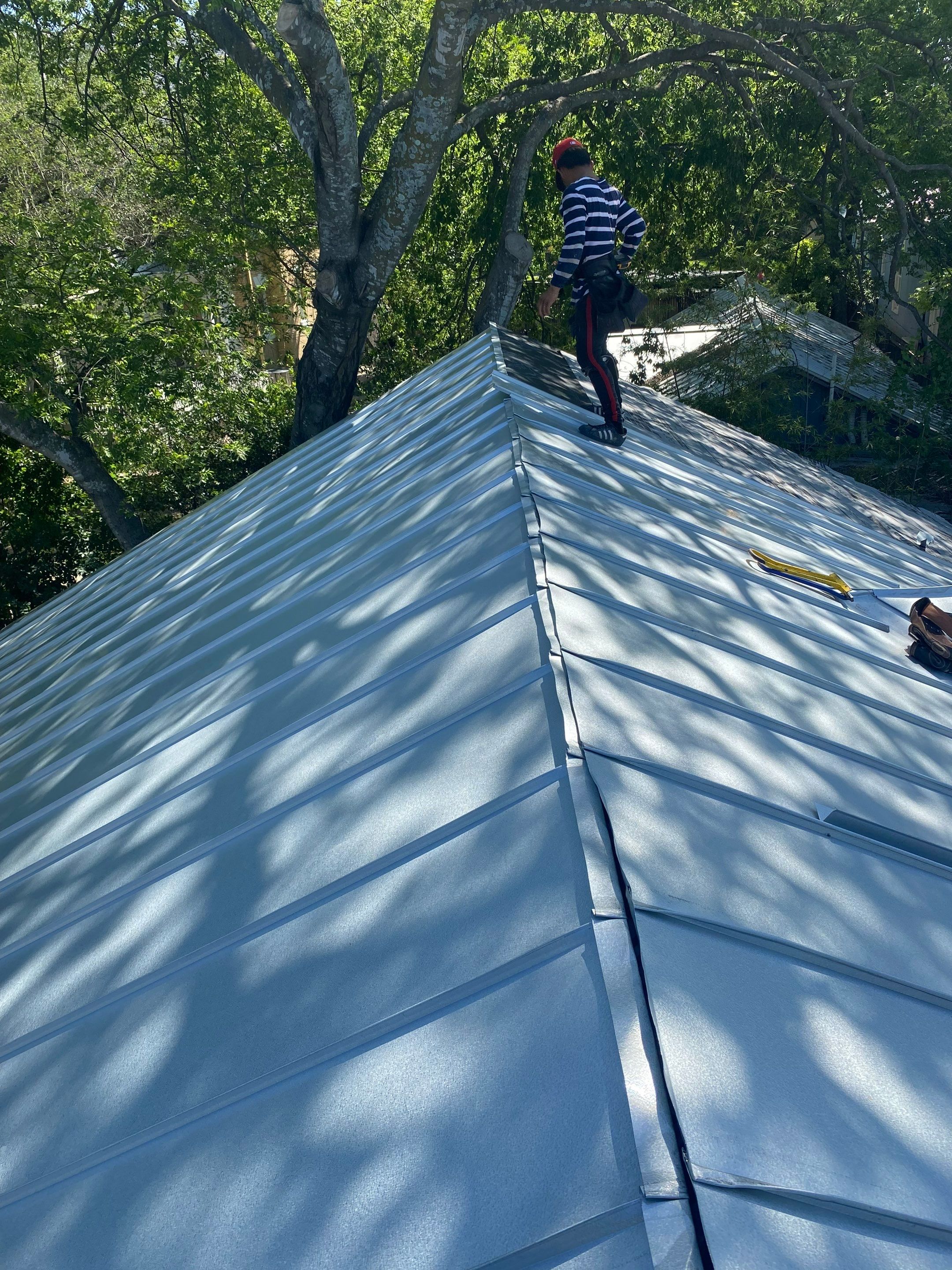 Residential Metal Roof Installation using McElroy Metal by Premier Roofing and Contracting