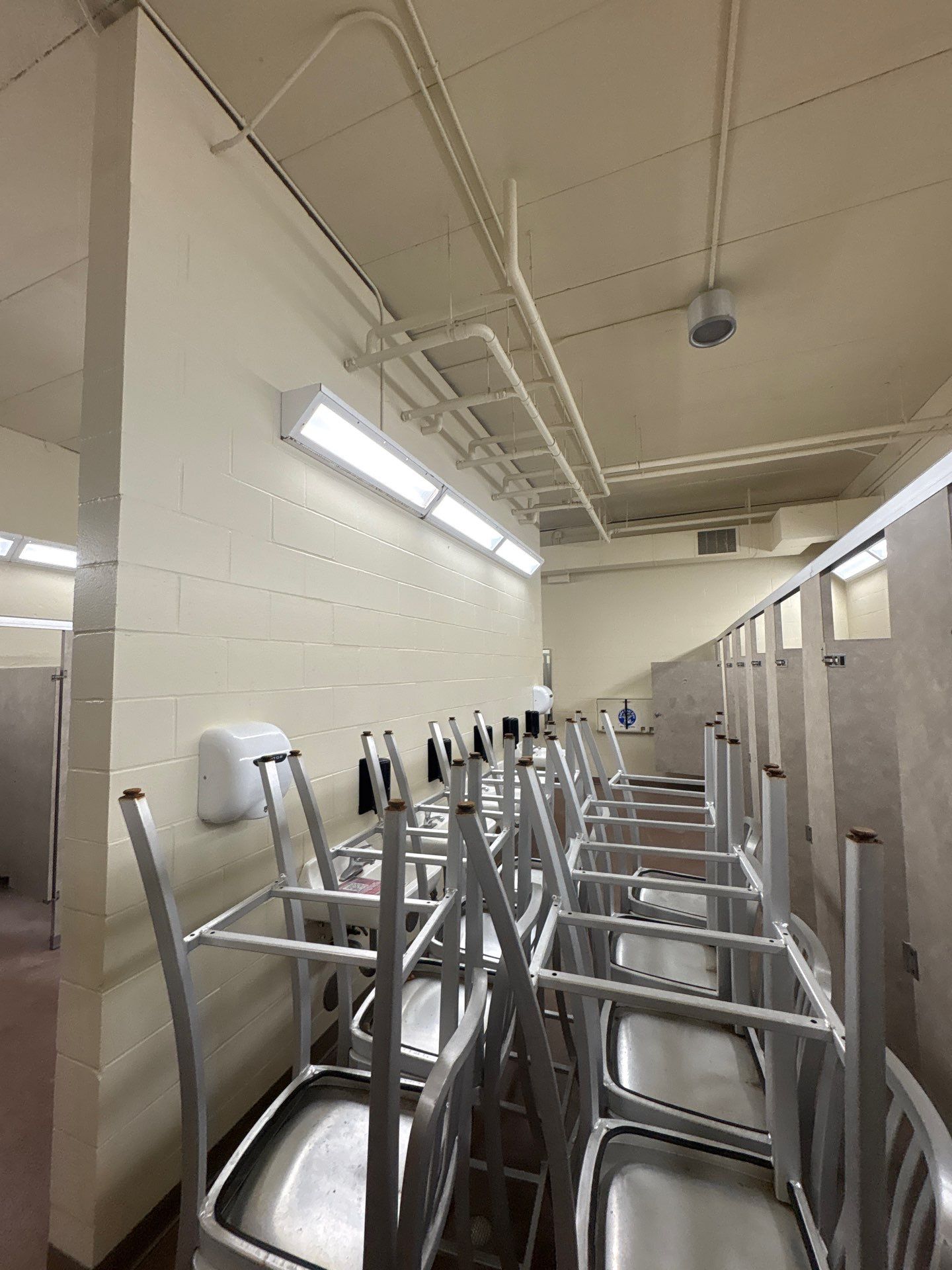 Commercial Restroom Interior Painting and Facility Updates in Sioux Falls by Select Painting, Coatings & Garage Cabinets