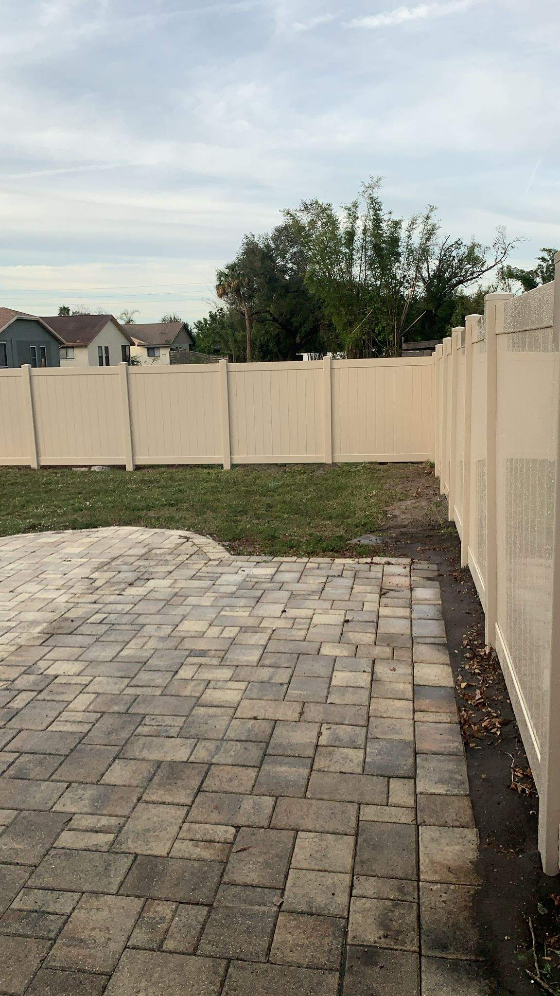 Vinyl Privacy Fence and Custom Paver Patio Installation in Lehigh Acres by True Fence LLC