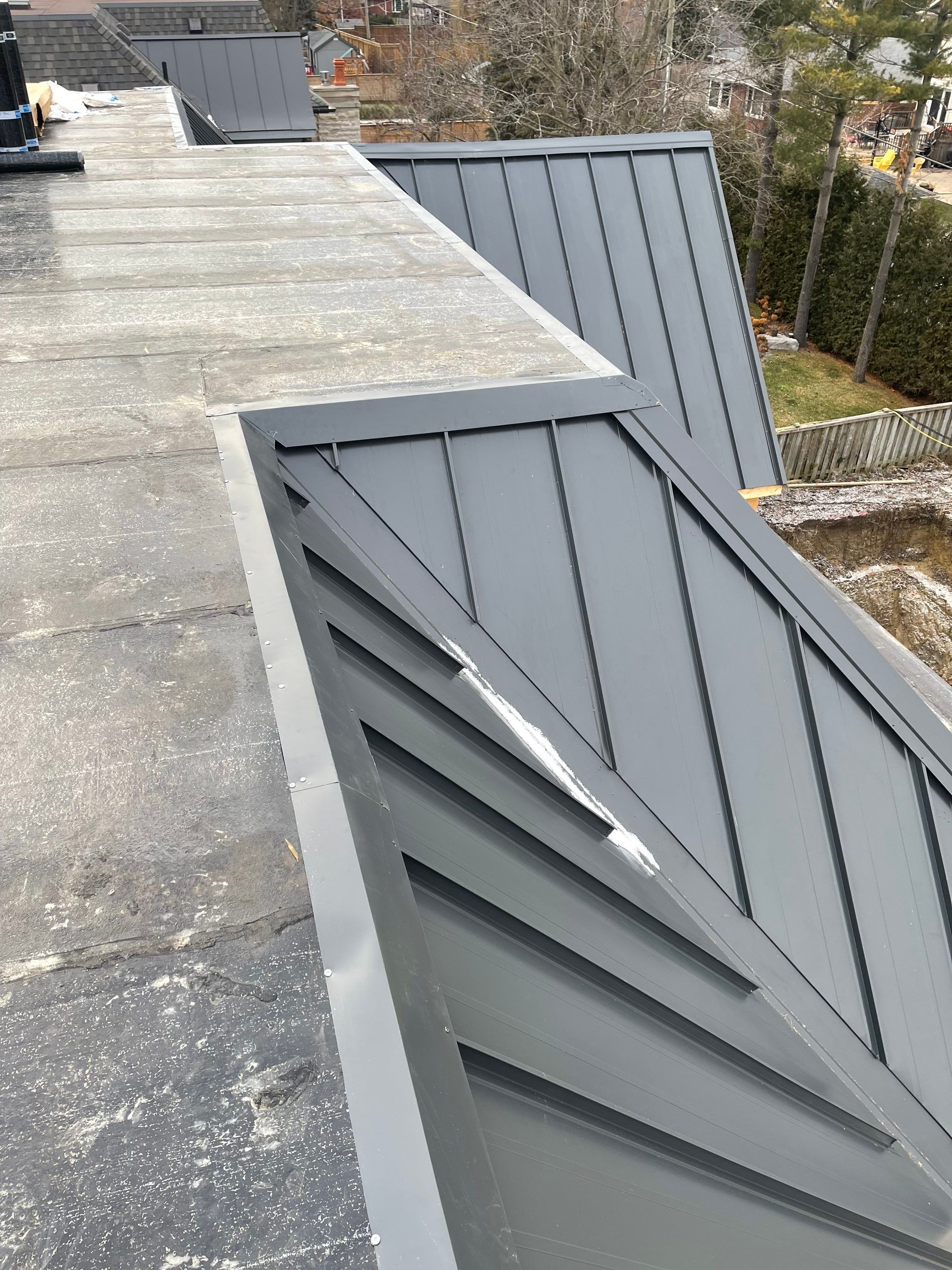 New Home Construction using 16" Standing Seam Panels by Jay Carter Roofing & Sheet Metal