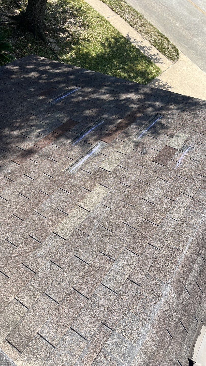 AMIG approved this roof for wind damage, fascia painting, and window work. by Roof Repair Company