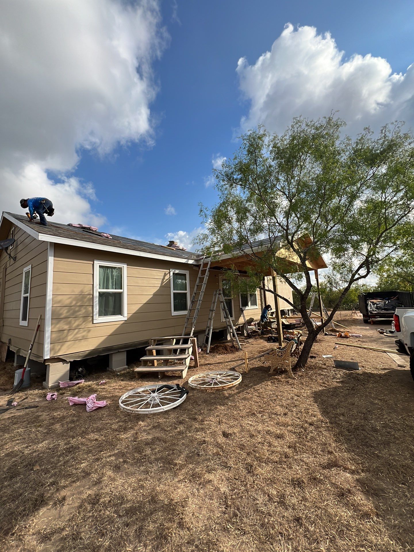 Front Porch Sitt'n by Bayfront Roofing and Construction
