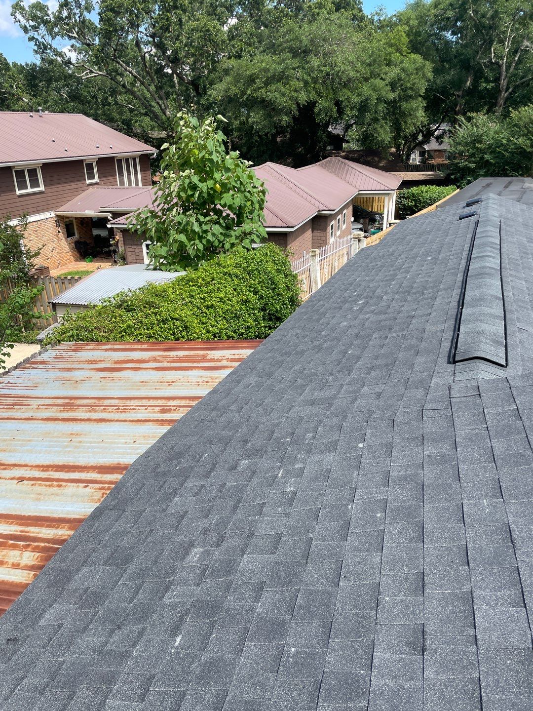Residential Roofing Installation using Roof Replacement by American Roofing & Construction LLC