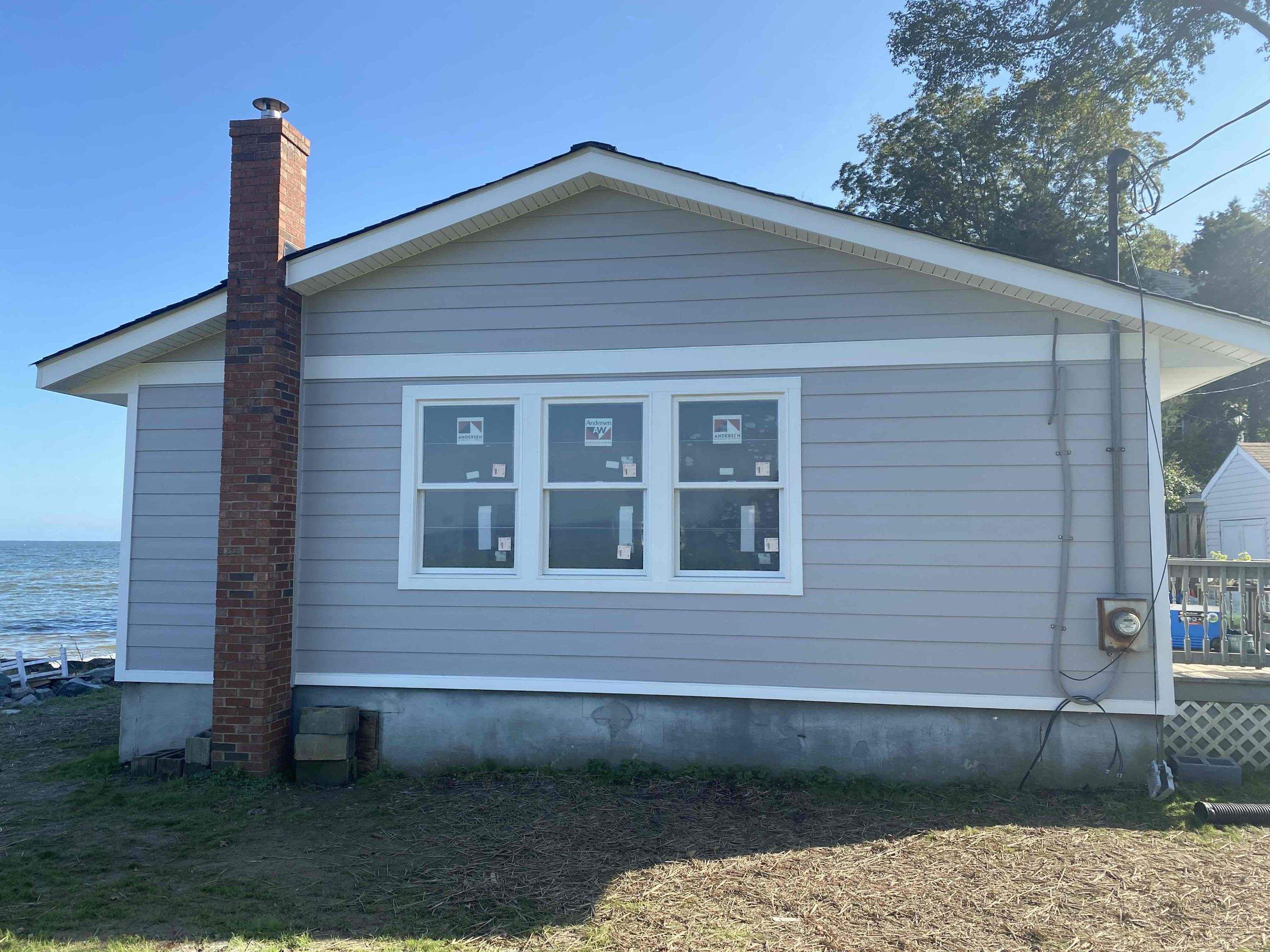 Siding Installation using JH Select Cedarmill Eased Edge by ExteriorPros