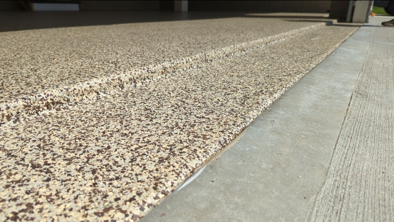 Garage using Cordwood by Select Painting, Coatings & Garage Cabinets