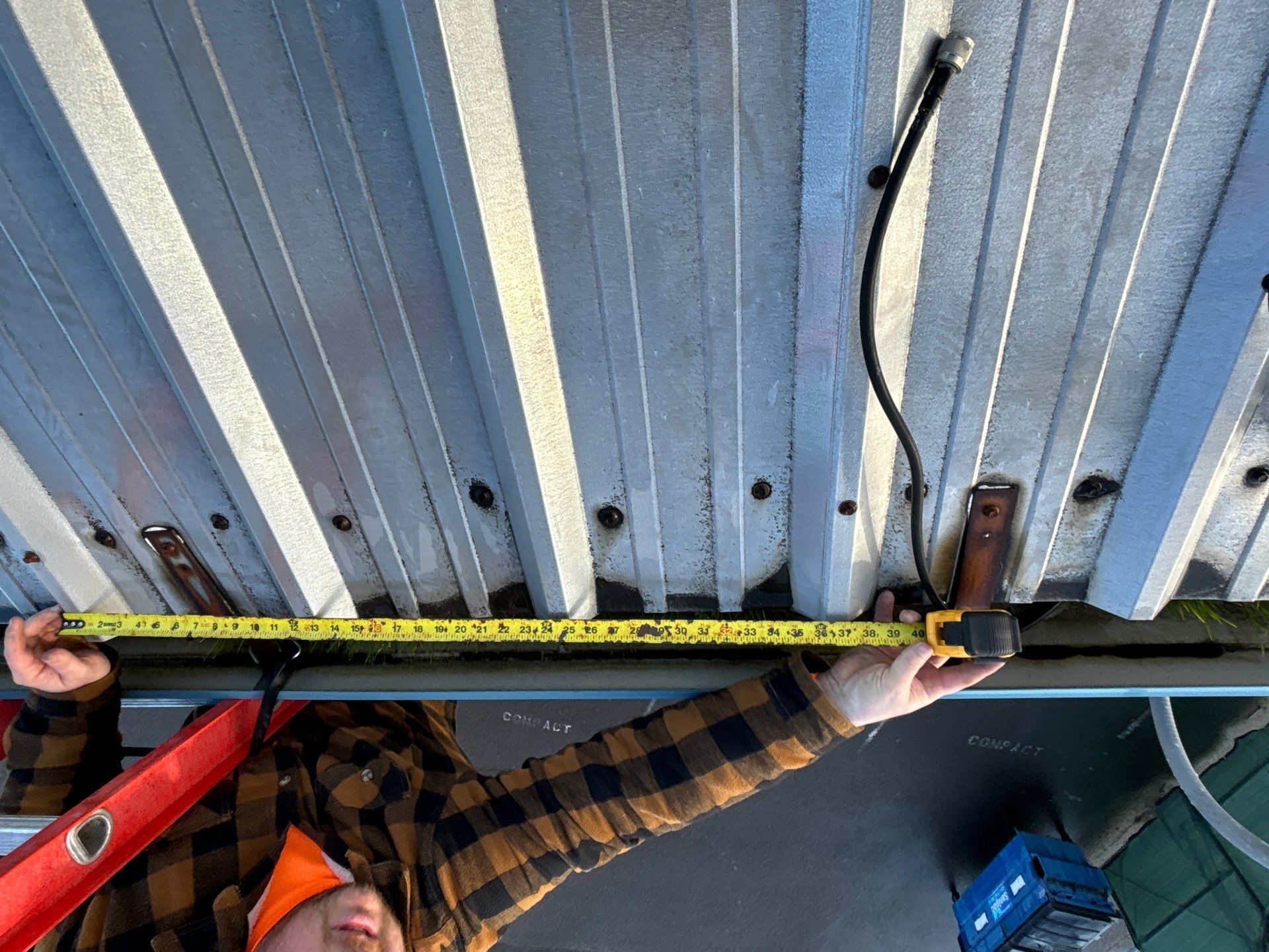 Installing New Curbs on a Metal Roof for new equipment by BEST Roofing & Waterproofing