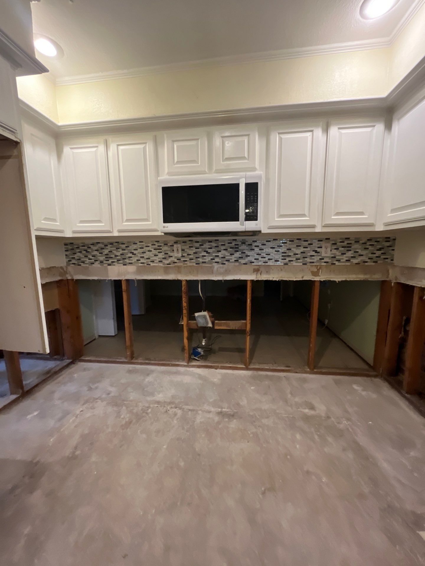 Home Remodel after Huge Water Damage by L&T General Contractors and Restoration INC