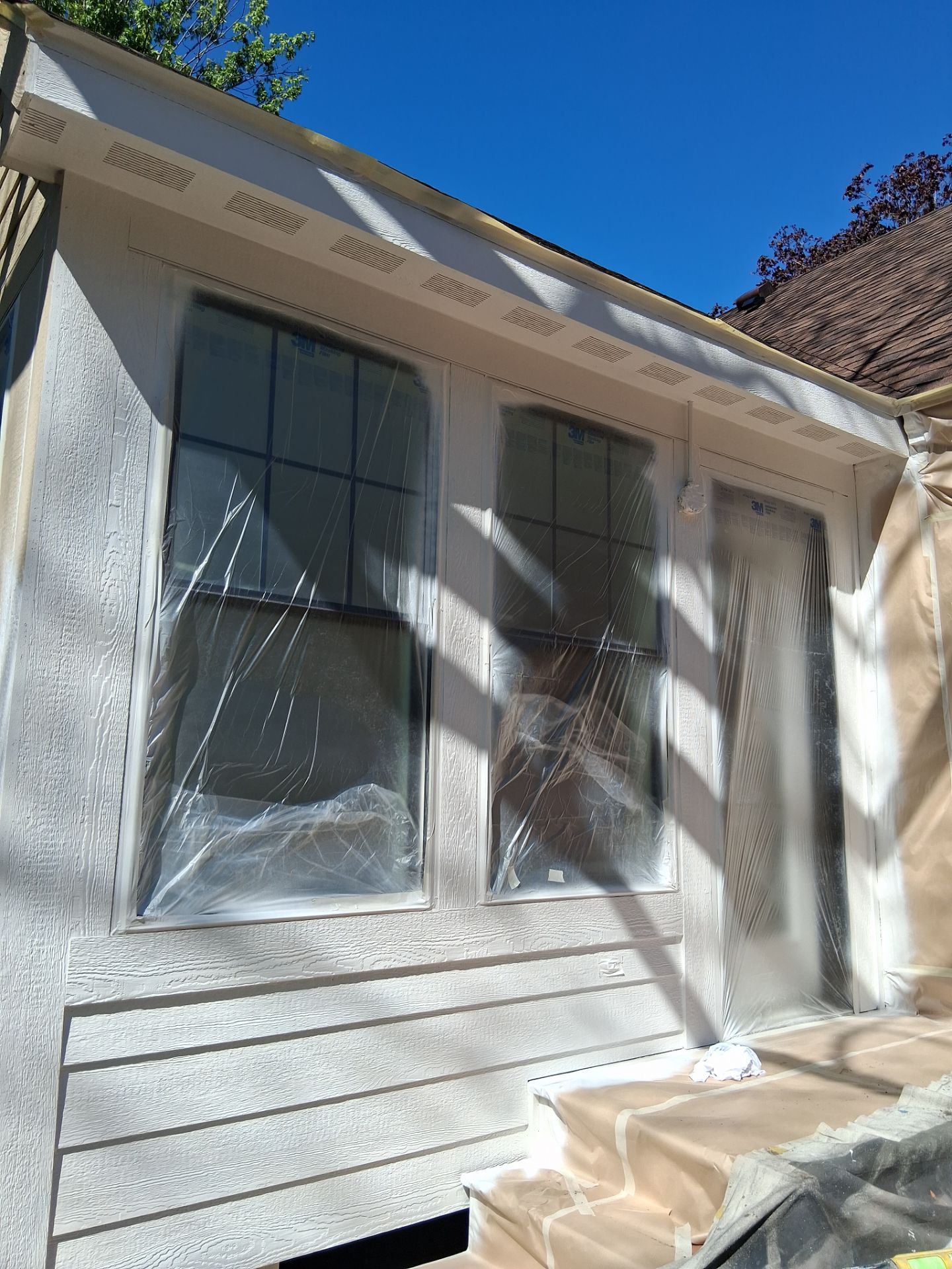 New 4 season room interior & exterior painting by Midwest Paint LLC