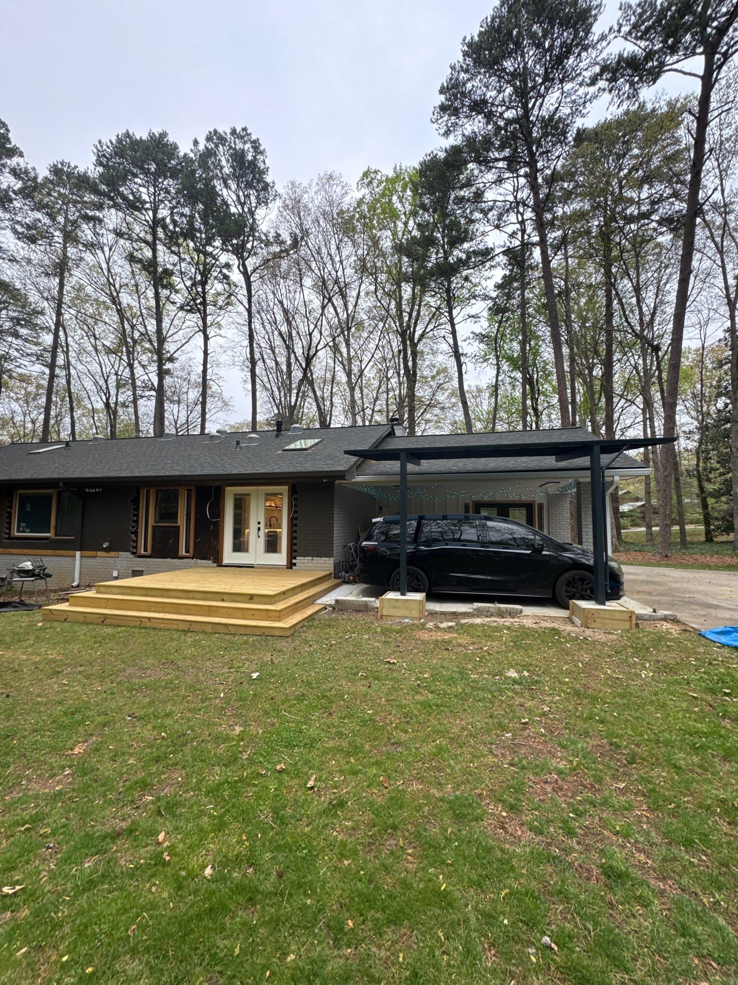 Modern Exterior Transformation and Multi-Tiered Deck Installation in Decatur by Swift Home Renovations
