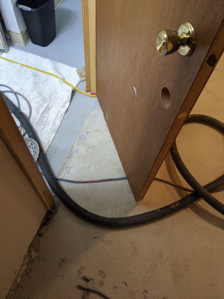 Basement Croc Floor Transformation using Pebble Beach by Croc Coatings, LLC