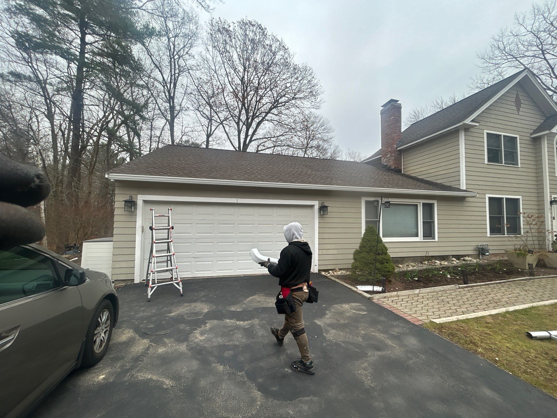 Chelmsford Garage Gutter System with French Drain Integration by Mighty Dog Roofing of Greater Middlesex County