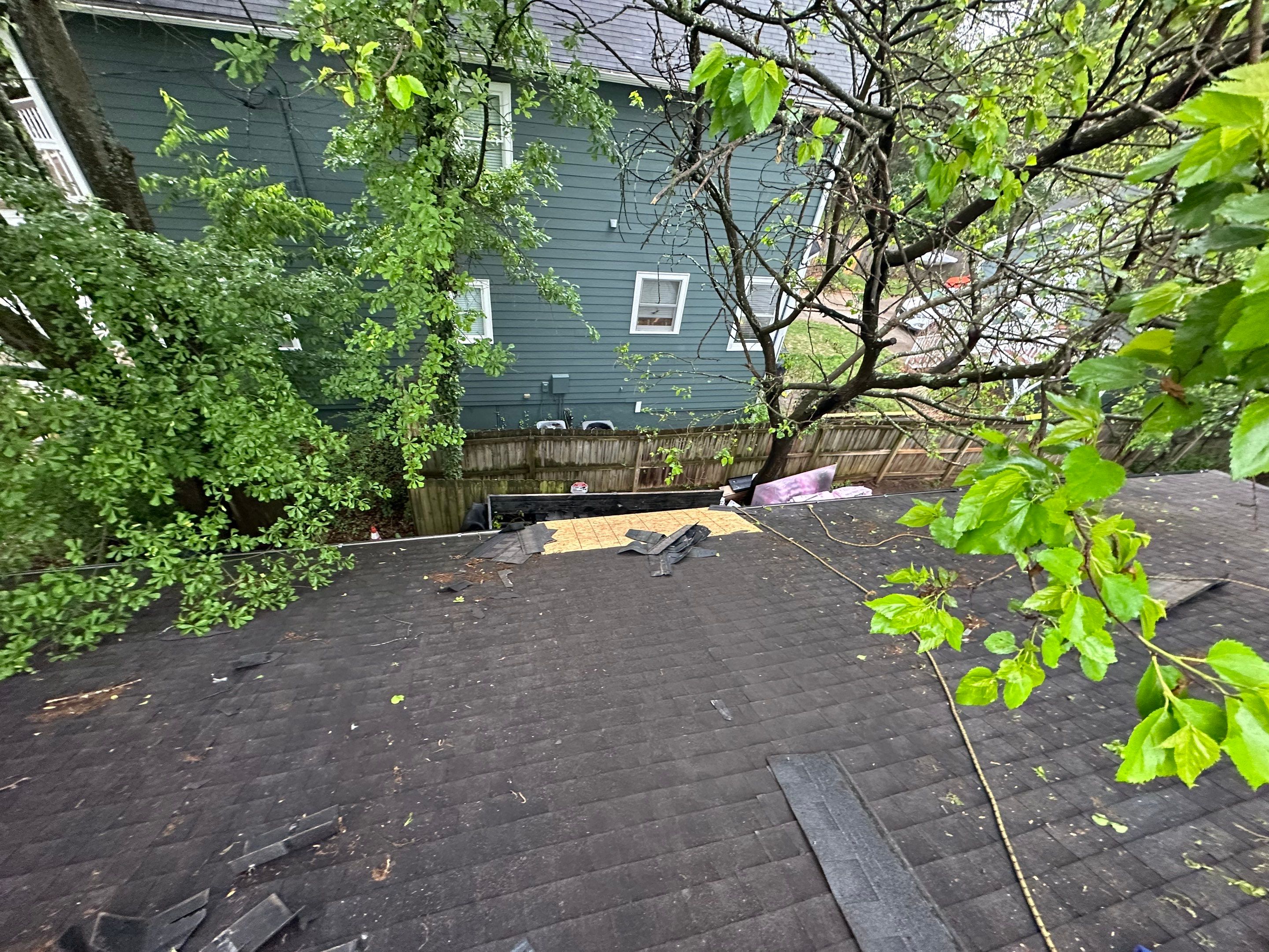 roof replacement and new black gutters by Nailed It Roofing & Remodeling LLC