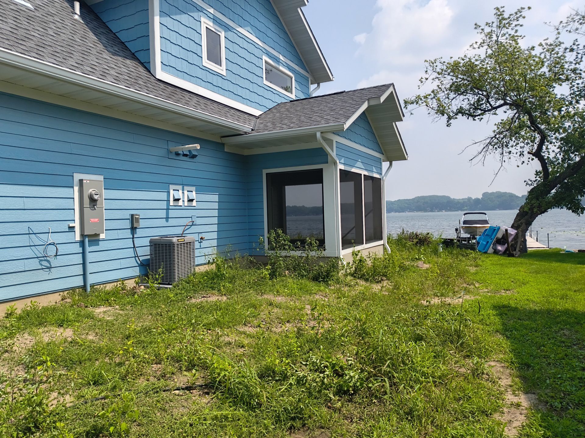 White Seamless Gutters in Maple Lake, MN by Next Level Seamless Gutters / Exteriors Inc.