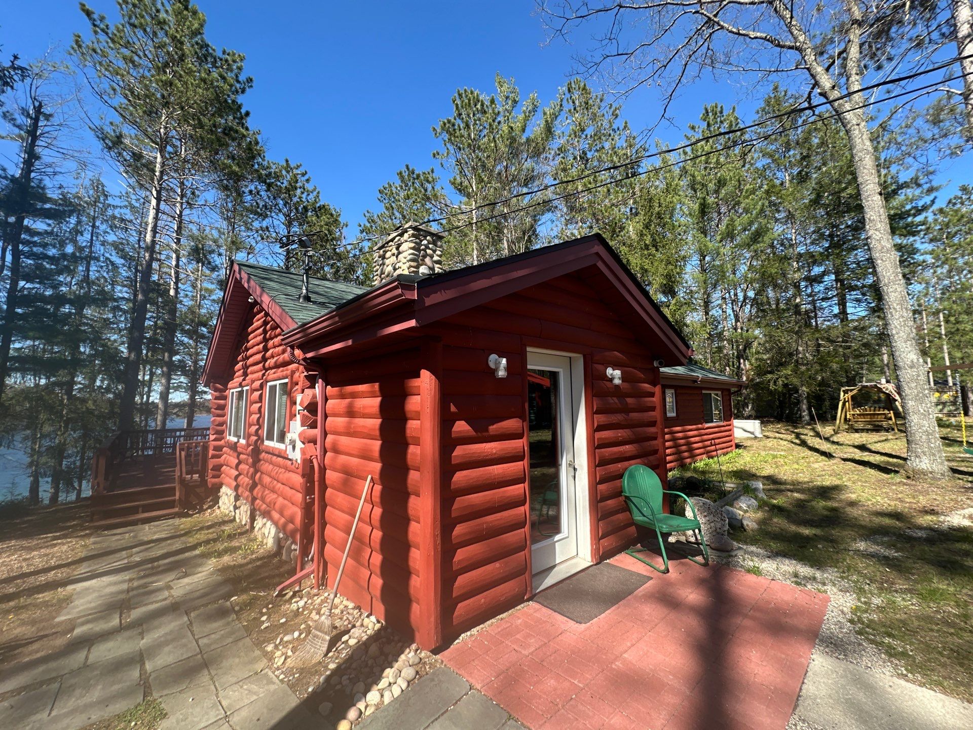 Gutter Helmet Protection System for Wooded Log Cabin in Johannesburg by Rainbow Seamless Systems