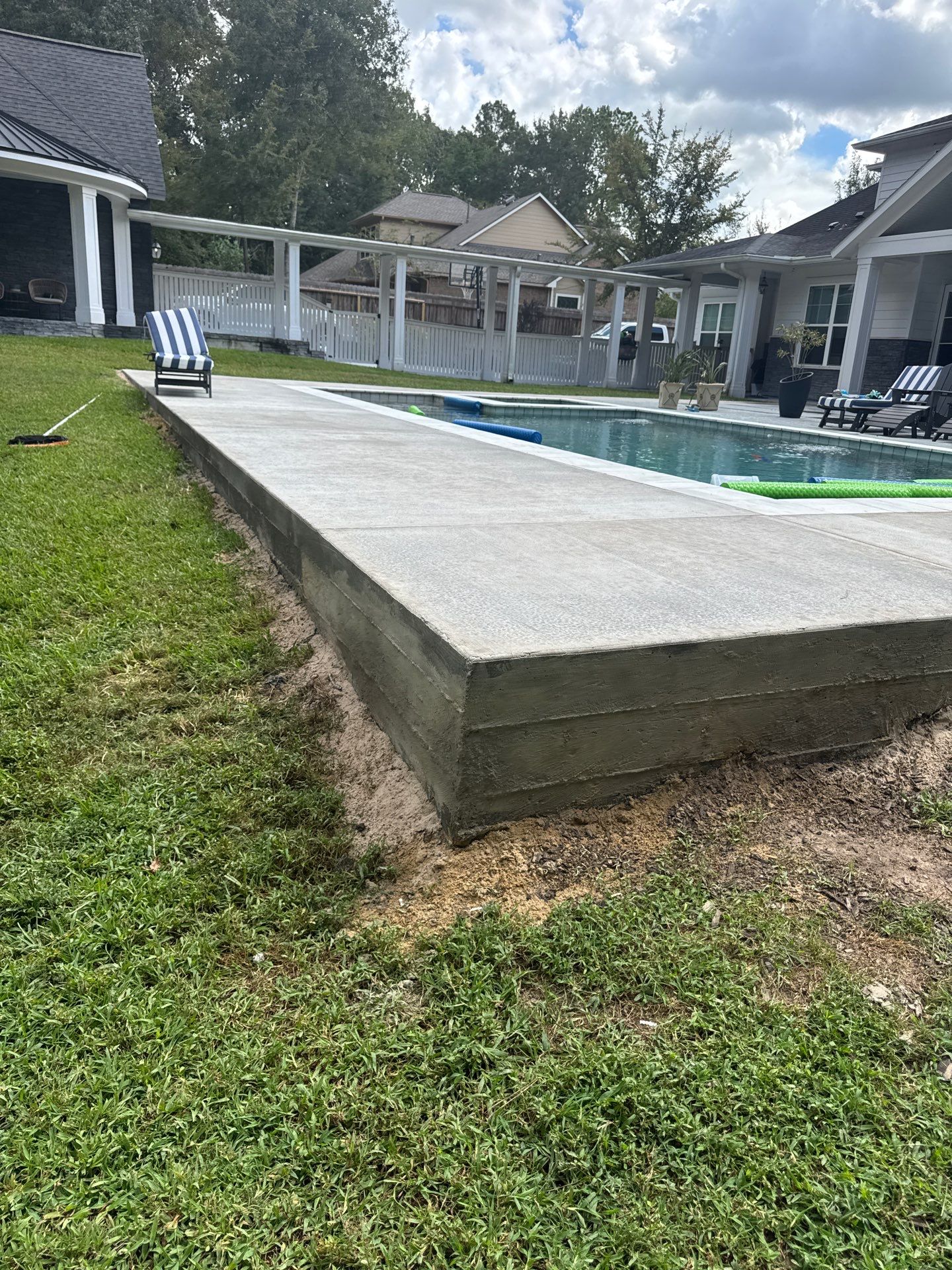 Huffman Roof Repair and Concrete Addition by Modern BYLT Roofing & Construction