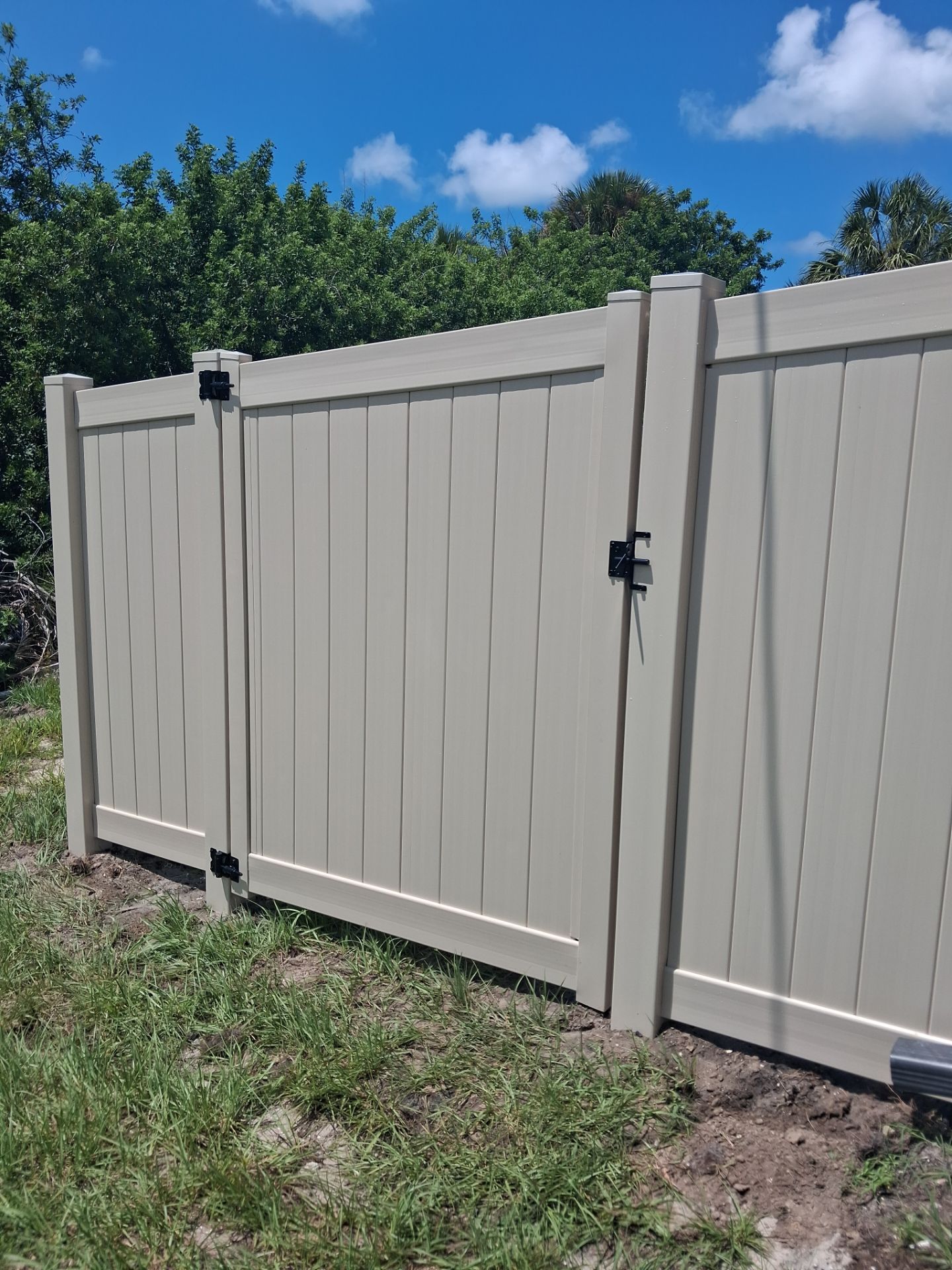 Vinyl Privacy Fencing and Aluminum Pool Security Installation in Port Charlotte by True Fence LLC