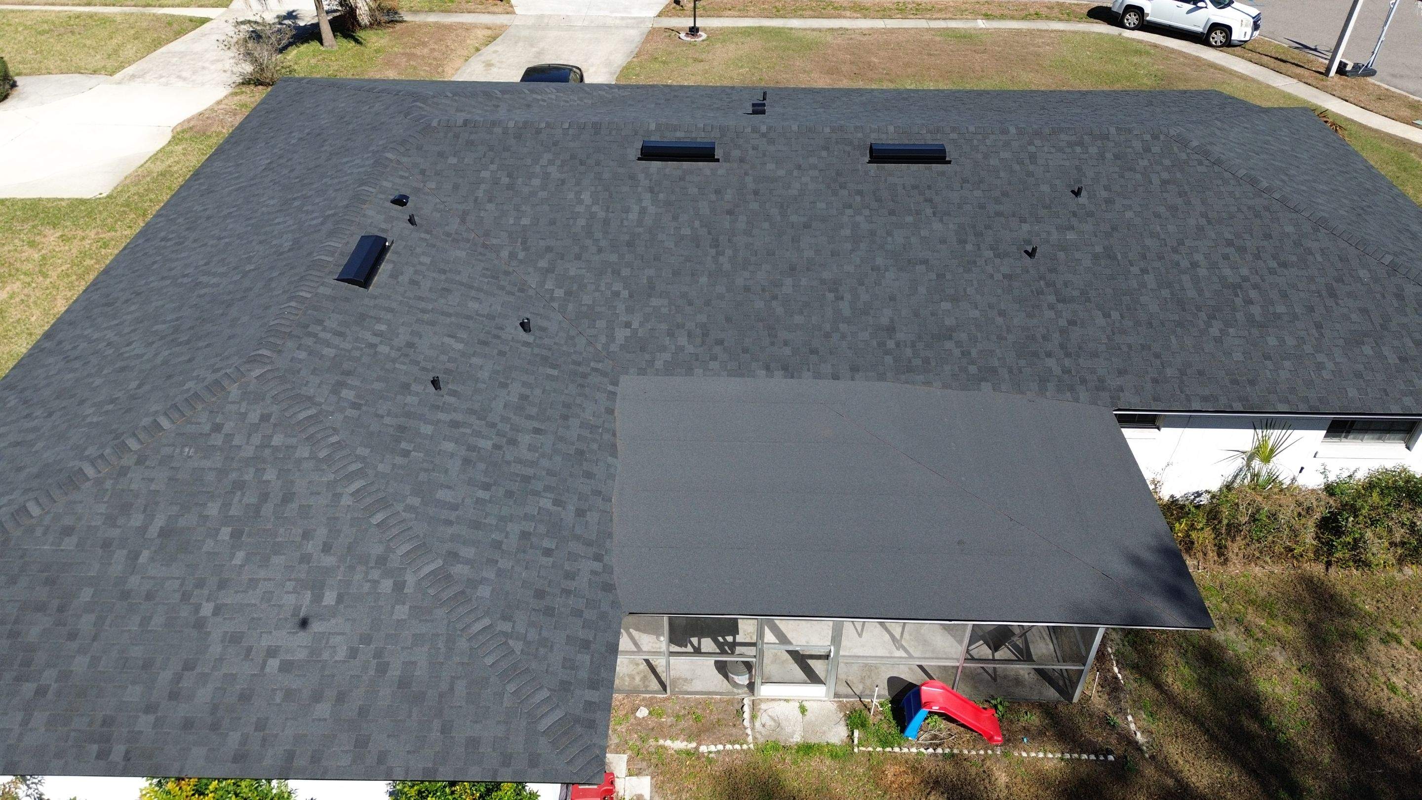 Moire black roof in Conway FL by Gold Key Roofing