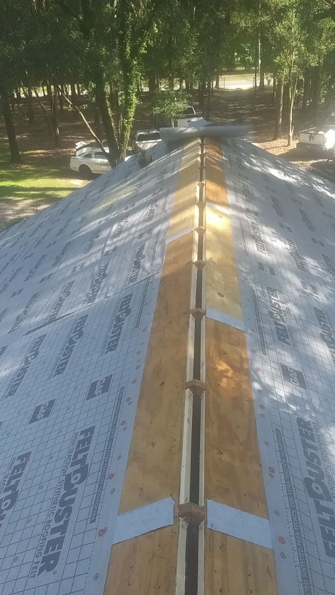 Residential Roofing Installation using Metal roofing by American Roofing & Construction LLC