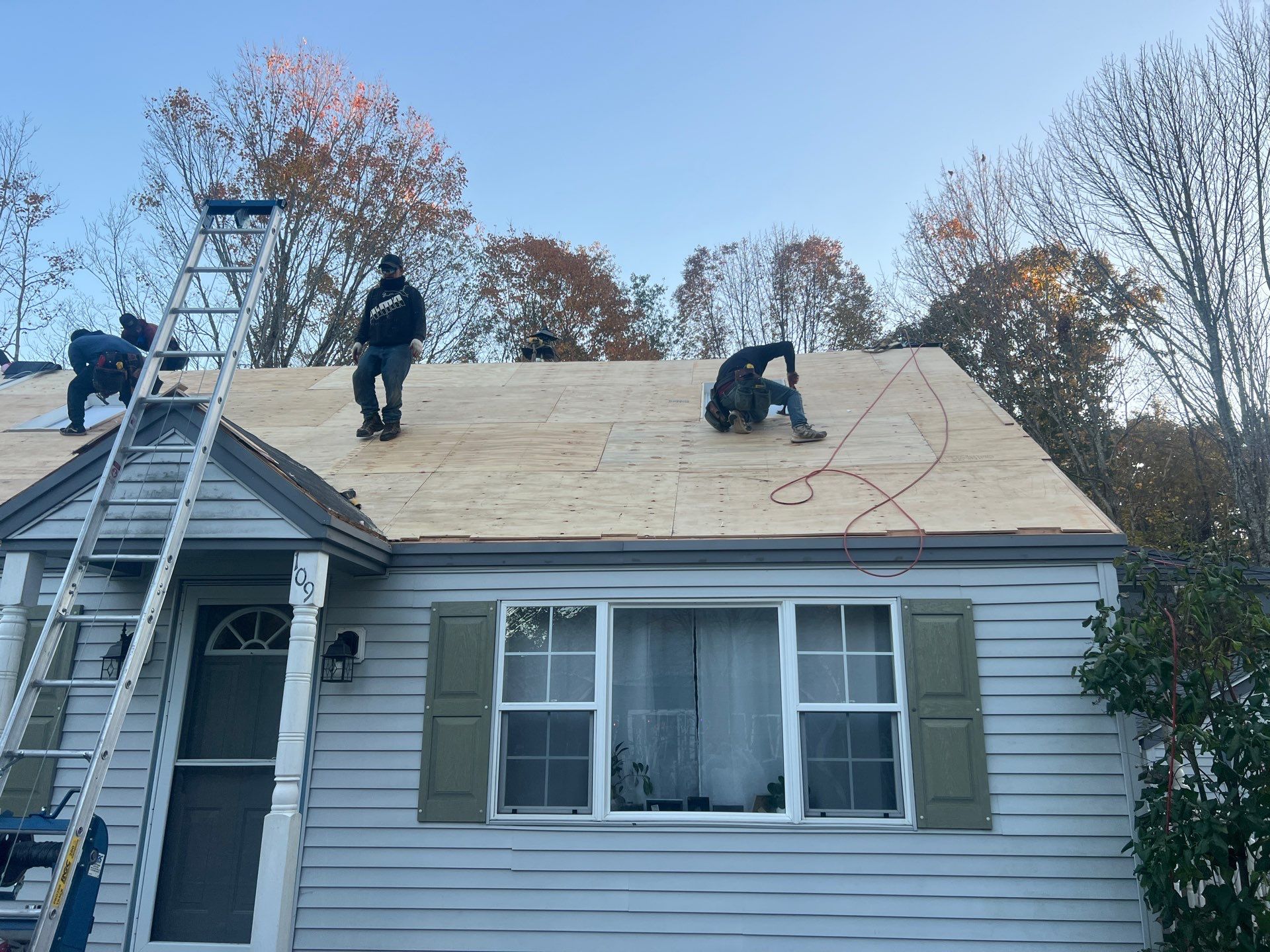 Complete Exterior Renovation Featuring Owens Corning Shingles and Vinyl Siding by Tall pine roofing